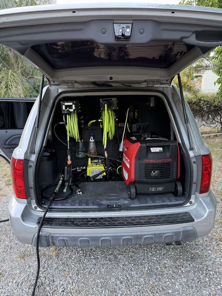 Luxury Auto Detailing mobile setup with tools and supplies